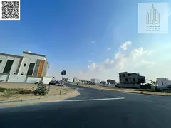 CORNER Residential investment land with villas in Ajman, Al Tilla 2 area. The land covers an area of