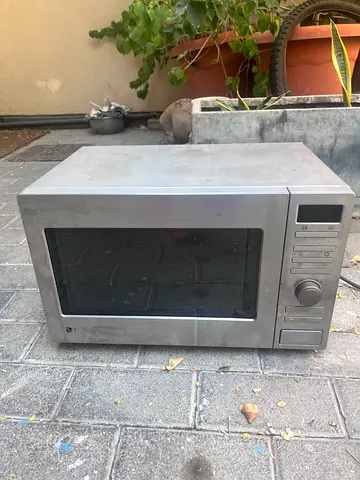 Used countertop electric oven / microwave in stainless finish