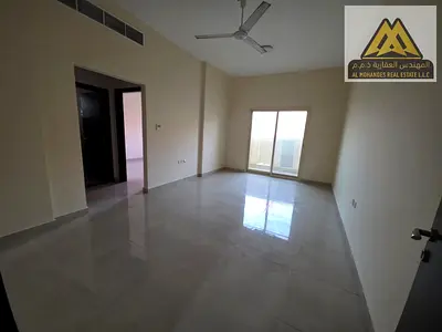 For rent: 1-bedroom apartment with hall in Al Rumaila 1, Ajman Corniche. AED 28,000 yearly, 6 payments, balcony, open view, prime location.