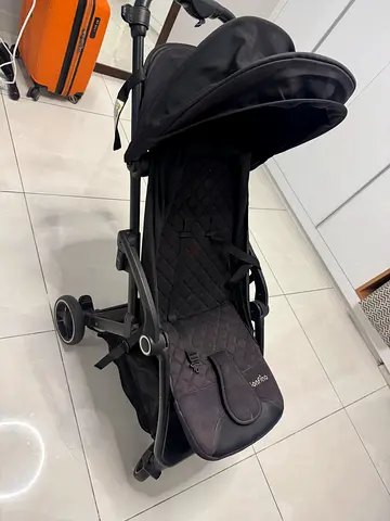 Lightweight black baby stroller/pram in good condition