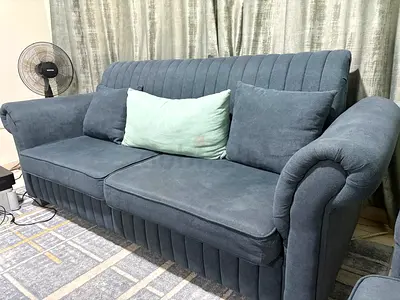 Three-seater fabric sofa in good condition - greyish blue