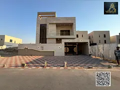 Villa on Sheikh Mohammed bin Zayed Street, personal finishing, two floors and a roof of large spaces