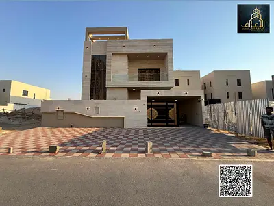 Villa on Sheikh Mohammed bin Zayed Street, personal finishing, two floors and a roof of large spaces