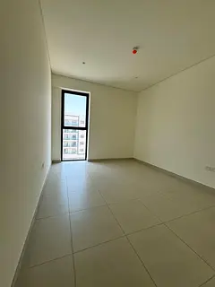 Two-bedroom apartment with a living room for annual rent in Al Zahia, Muwaileh. New building. Two be