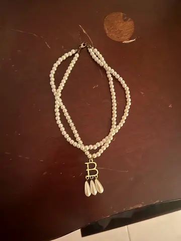 Triples-strand faux pearl necklace with Anne Boleyn pendant