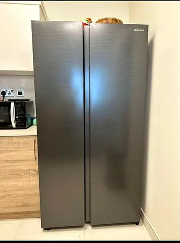 Samsung side by side fridge and freezer new model slightly used