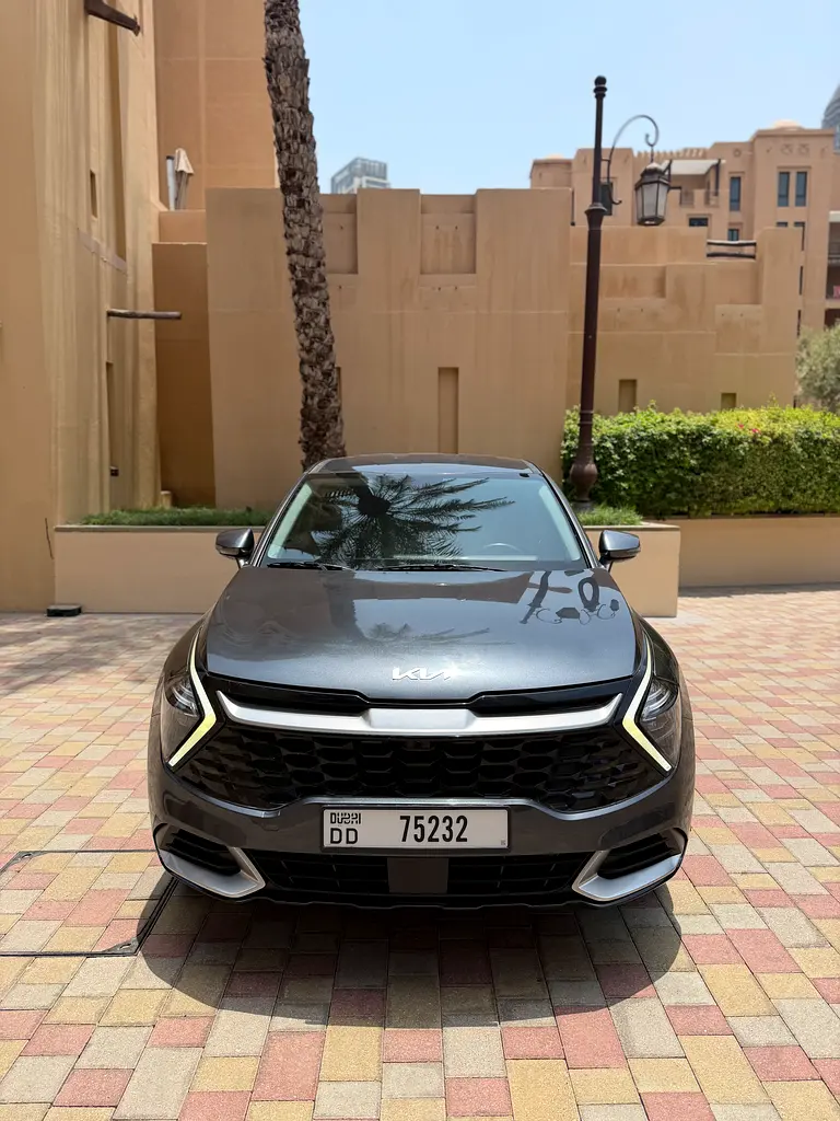 Kia Sportage 2023 — photo 1 of 14