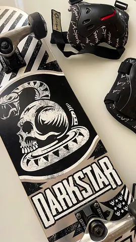 Darkstar skateboard with protective knee and elbow pads for youth – used, good condition