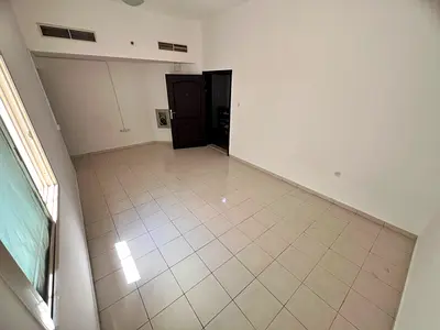 Studio for rent Al Mowaihat 2 near Shorooq Mall separate kitchen central AC 18K yearly