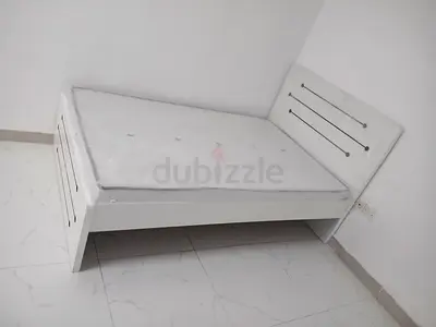 White single bed frame with headboard and mattress included