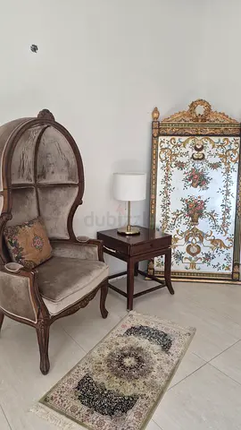 Classic carved wooden armchair with side table and decorative screen - set