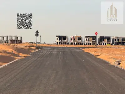 Investment plots for sale in Basateen Al Surra, Umm Al Quwain, strategic location, full infrastructure, price inclusive of fees