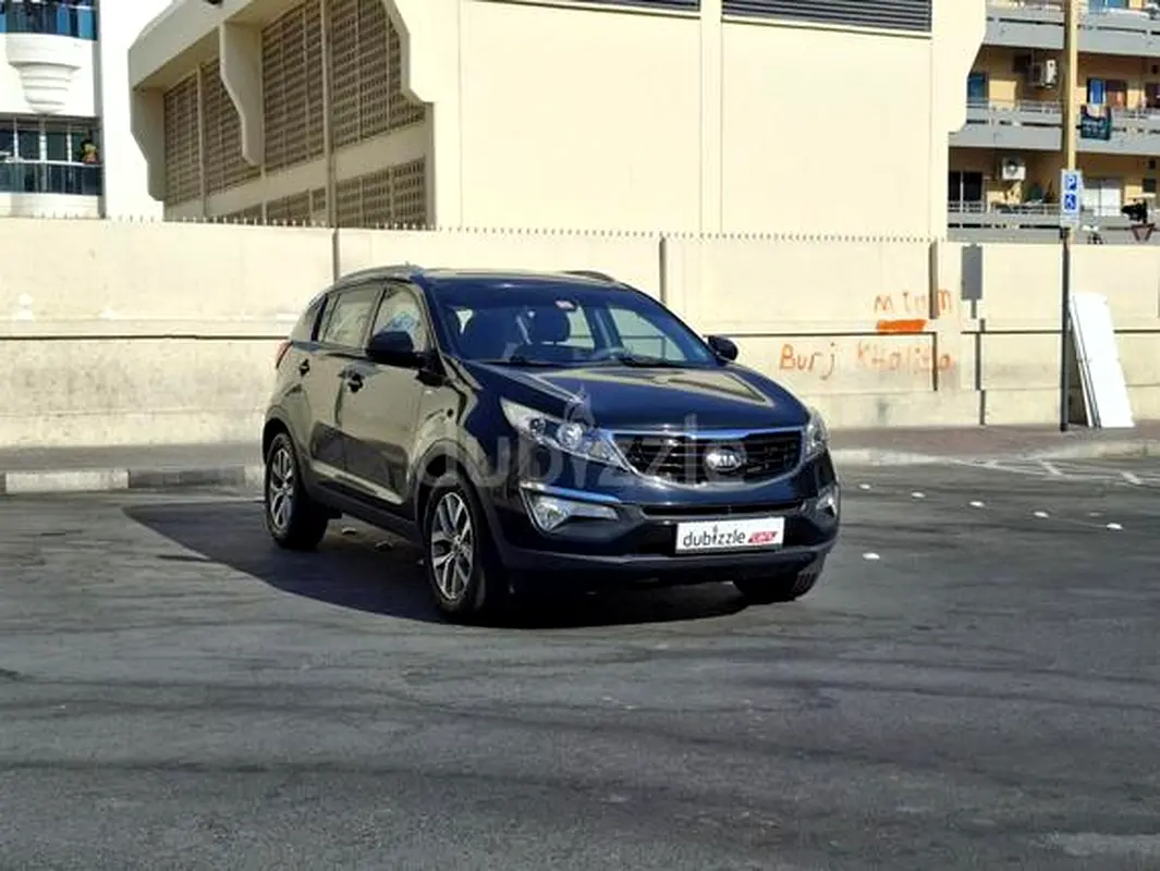 Kia Sportage 2015 — photo 1 of 20