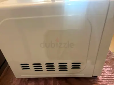 Used white microwave oven - good working condition ( Toshiba )