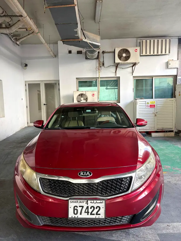 Kia Optima 2012 — photo 1 of 4