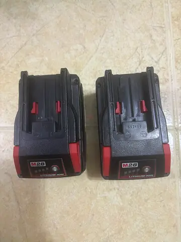 Pair of M28 Power Tool Batteries - Good Working Condition