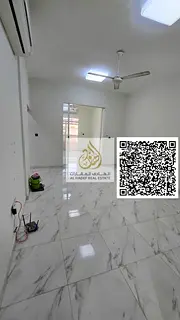 One-bedroom apartment with a living room and a majlis in Al Rawda 3; features 2 bathrooms and a balc