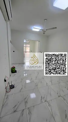 One-bedroom apartment with a living room and a majlis in Al Rawda 3; features 2 bathrooms and a bal
