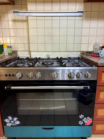 Used stainless steel freestanding gas range with oven - good working condition
