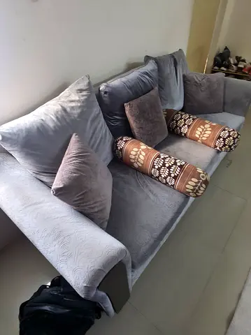 Comfortable 3 Seater Sofa with Decorative Pillows and Bolsters