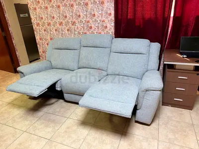 Light grey 3-seater reclining sofa in good condition