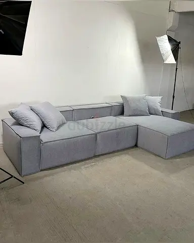 Light grey modular L-shaped sofa with chaise - good condition