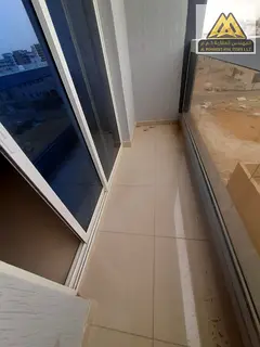 A spacious one-bedroom apartment with a balcony in Al-Jarf 3, near the Chinese Market and the Tribal