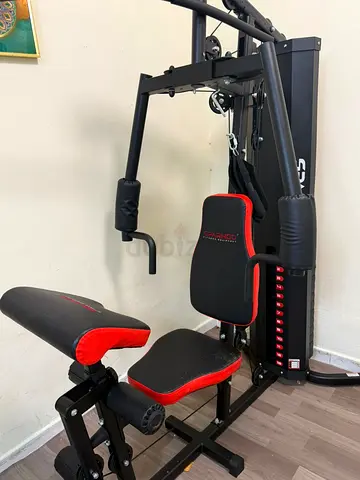 Compact home multi-gym station with weight stack — good condition