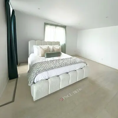 Modern upholstered queen bed with curved headboard - white boucle