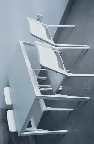 IKEA extendable dining table with 4 chairs in white color