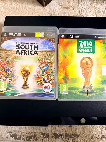 PS3 console with two FIFA world cup games