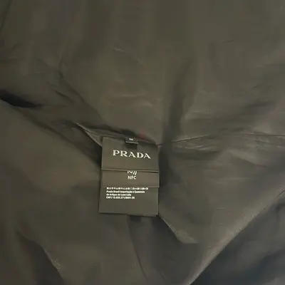 Authentic Prada black jacket — size M, inner label shown