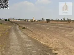 Large corner residential plot of land