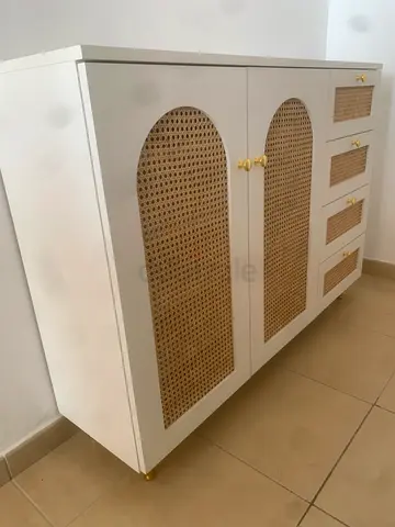White wooden cabinet with rattan panels and gold handles - medium size
