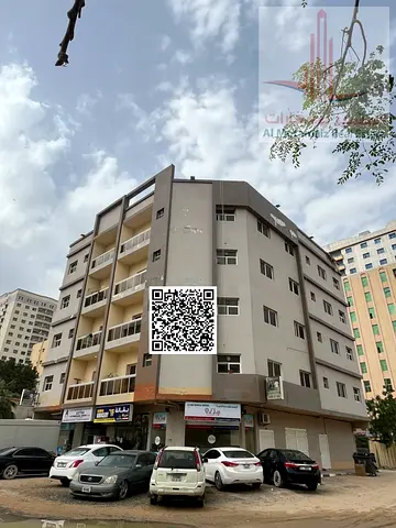 One-bedroom apartment with a living room and central air conditioning; Al Rashidiya 2, Al Basma Building.