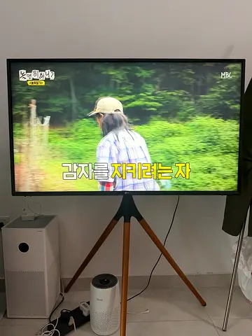 LG Smart LED TV with Wooden Tripod Stand