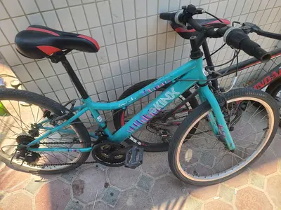 Used womens/teen mountain bike - 26 teal frame, good working condition
