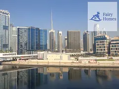 Full Canal &amp; Burj Khalifa View | 1BR Apartment | Balcony | Mayfair Residency