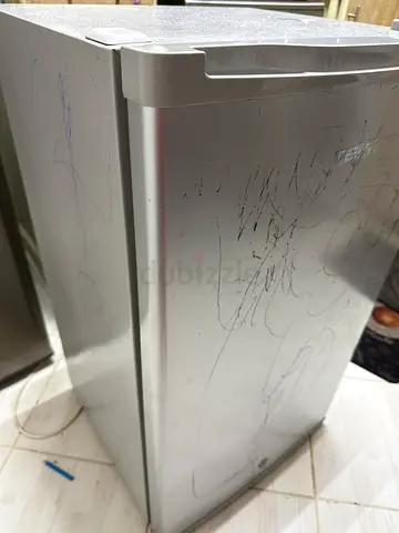 Single-door silver refrigerator / freezer - used