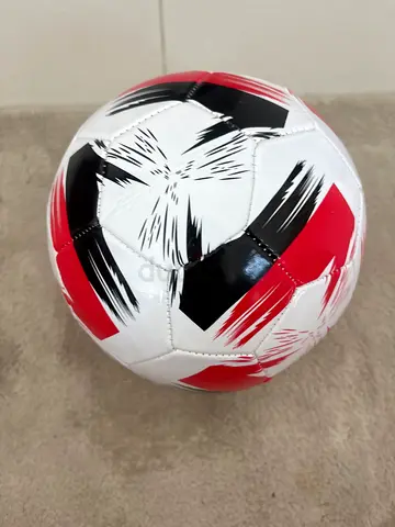 Used size 5 football / soccer ball - white with red  black design