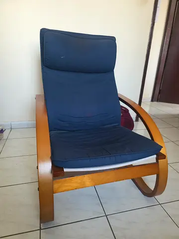 Wooden frame lounge chair with navy cushion - good condition