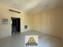 Annual rental: Spacious studio in Al Rashidiya 2 – Ajman, featuring a large area, semi-separate ki