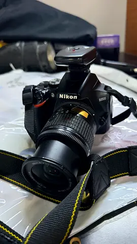Nikon D3000 DSLR with 18-55mm kit lens and strap - Good working condition