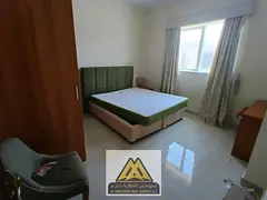 Two bedrooms and a living room with a balcony, fully furnished, and free internet in Al-Jarf 2 area,