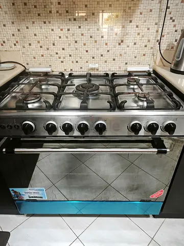 Moving Out Sale: Super General 5-Burner Gas Cooking Range (90x60) – Fully Working!