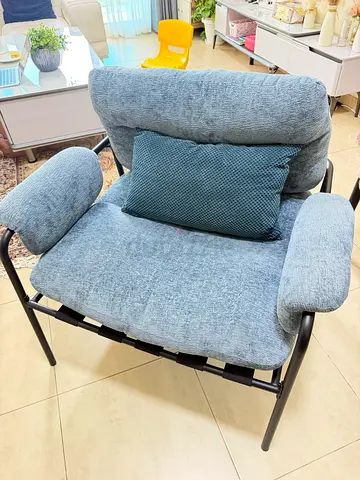 Single blue fabric lounge chair with cushion - good condition