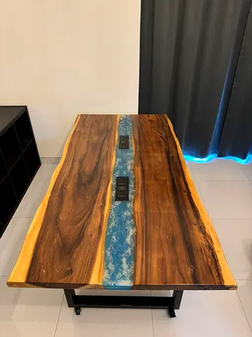 Live edge wood table with epoxy river and metal frame