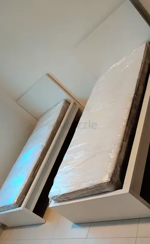 Ikea single size bed with mattresses  available in perfect condition