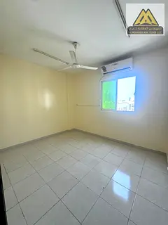 Two-bedroom apartment with a living room | Al Rawda 1 | Annual rent | Great space | Vibrant area | C