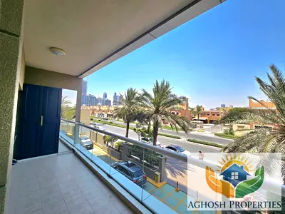 Elegant 1-Bedroom Apartment with Expansive Balcony | Golf View Residence